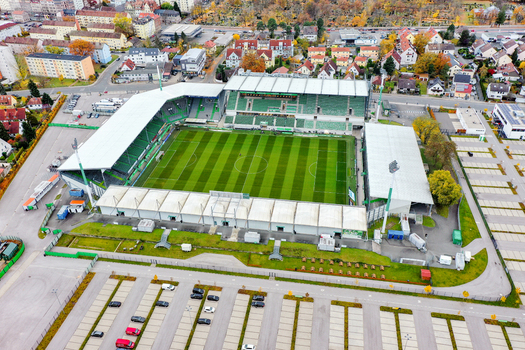 Furth Germany 02 May 2026 Aerial view of Sportpark Ronhof Thomas Sommer stadium with its green pitch and stands surrounded by urban buildings and parking lots.