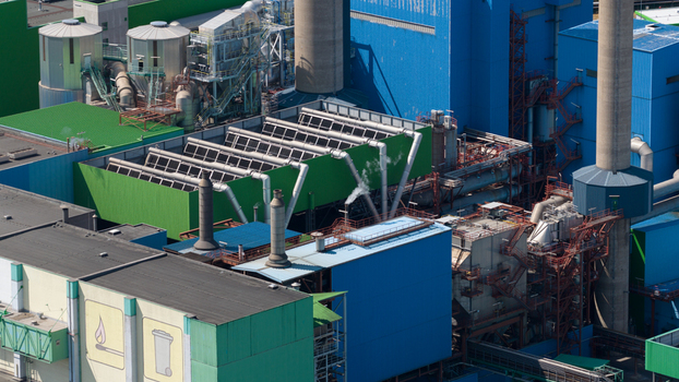 Aerial view of the Abfallkraftwerk Herten waste to energy plant with complex industrial piping chimneys and metal structures Herten Nordrhein Westfalen Germany.