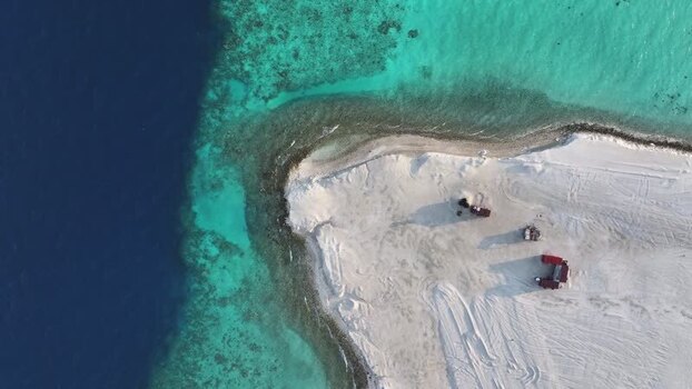 Aerial view of Rasmale Project and turquoise ocean Maldives. Aerial view of Rasmale Project and turquoise ocean Maldives.