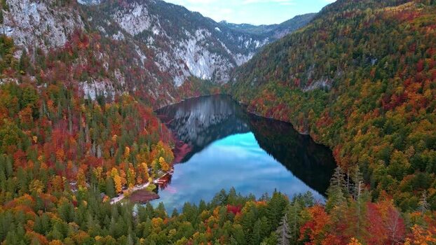 Aerial view of Attersee lake with autumn foliage Austria.