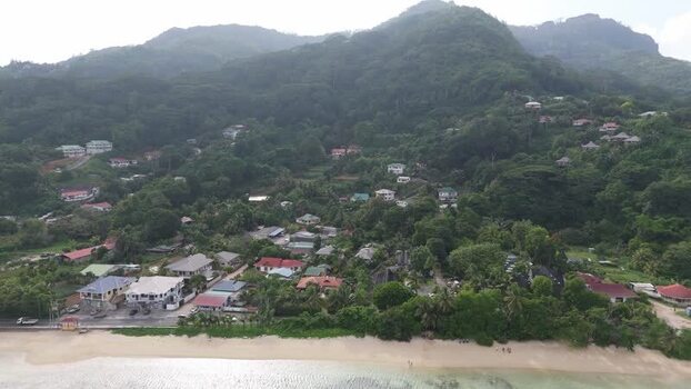Aerial view of Mahe island coastline and hillside homes Seychelles.