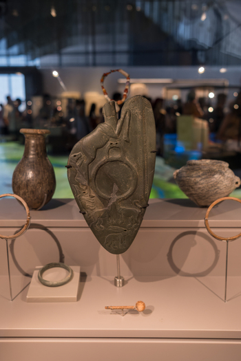 Giza Egypt 16 May 2026 View of the Grand Egyptian Museum featuring ancient stone carvings and artifacts displayed in a modern exhibition hall.