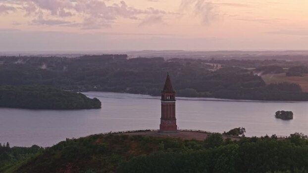 Aerial view of Himmelbjerget tower at sunset Denmark.