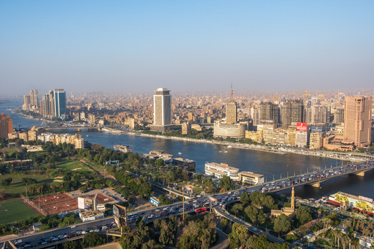 Cairo Egypt 19 October 2025 View of the Nile River shimmering under a clear sky framed by the modern skyline of Zamalek and bustling bridges. Cairo Egypt 19 October 2025 View of the Nile River shimmering under a clear sky framed by the modern skyline of Zamalek and bustling bridges.