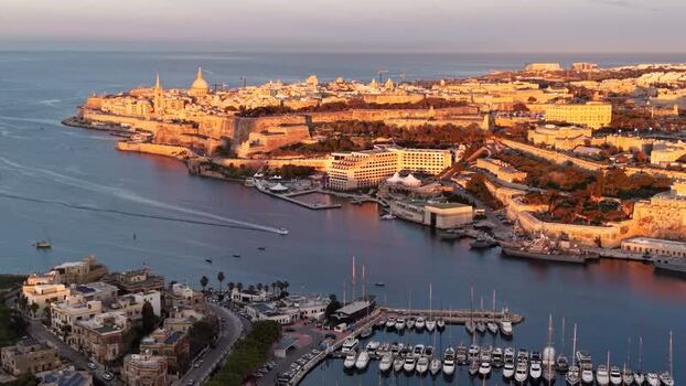 Aerial view of Valletta city and the Grand Harbour at sunset Malta.