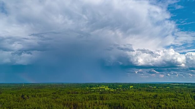 Aerial view of forest landscape under storm clouds in Latvia. Aerial view of forest landscape under storm clouds in Latvia.