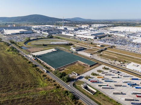 Aerial view of the Volkswagen Slovakia plant in Devinska Nova Ves with industrial buildings car parking lots and logistics areas in Bratislava Bratislavsky kraj Slovakia. Aerial view of the Volkswagen Slovakia plant in Devinska Nova Ves with industrial buildings car parking lots and logistics areas in Bratislava Bratislavsky kraj Slovakia.