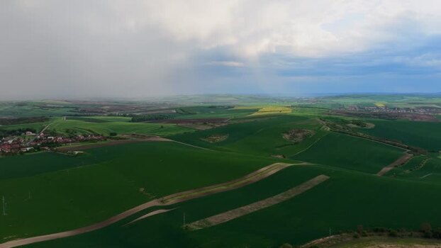 Aerial view of rolling green hills in the Moravian countryside Czechia.
