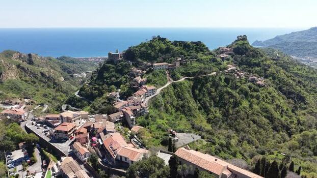 Aerial view of the hilltop village of Savoca in Sicily Italy. Aerial view of the hilltop village of Savoca in Sicily Italy.