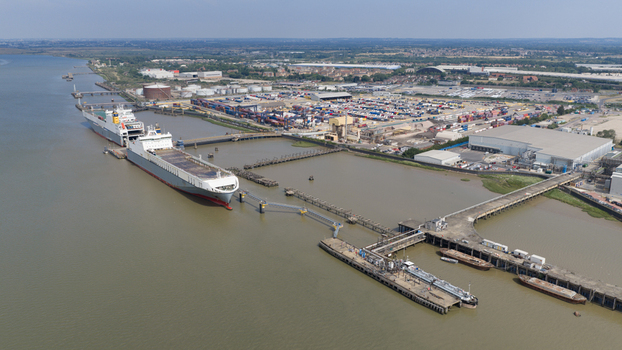 Purfleet on Thames United Kingdom 10 July 2026 Aerial view of Purfleet Container terminal with cargo ships docked at the pier shipping containers and industrial facilities.
