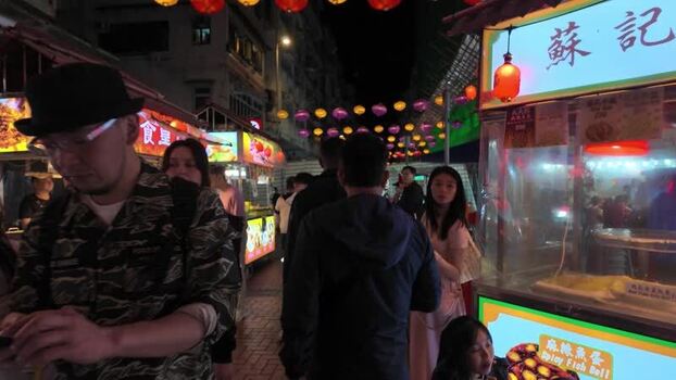 View of a night street market in Hong Kong.
