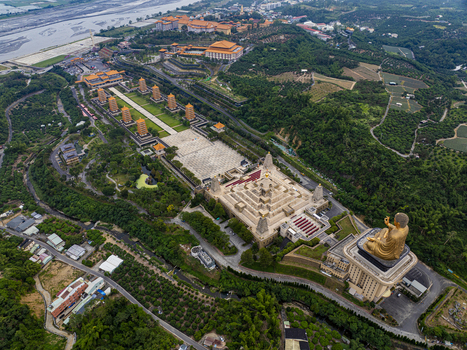 Aerial view of the Fo Guang Shan Buddha Museum featuring the Great Buddha statue pagodas and expansive courtyards surrounded by lush greenery in Dashu District Kaohsiung Taiwan. Aerial view of the Fo Guang Shan Buddha Museum featuring the Great Buddha statue pagodas and expansive courtyards surrounded by lush greenery in Dashu District Kaohsiung Taiwan.