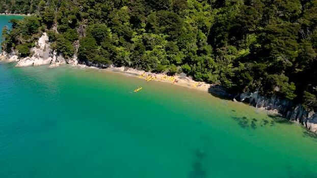 Aerial view of kayaks on beach Abel Tasman New Zealand. Aerial view of kayaks on beach Abel Tasman New Zealand.