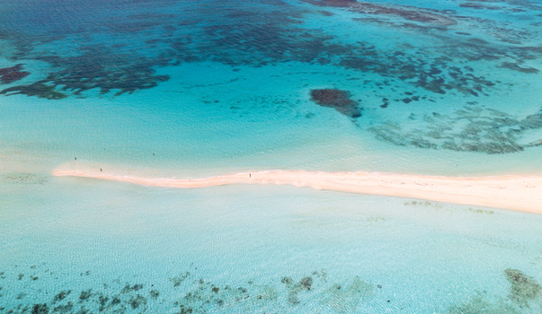 Aerial view of the white sandbar surrounded by crystal clear turquoise water in the Los Roques archipelago Los Roques Dependencias Federale Venezuela. Aerial view of the white sandbar surrounded by crystal clear turquoise water in the Los Roques archipelago Los Roques Dependencias Federale Venezuela.