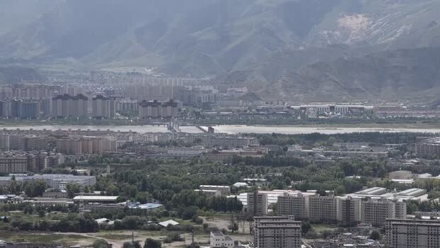 Aerial view of Lhasa cityscape and Lhasa River China.