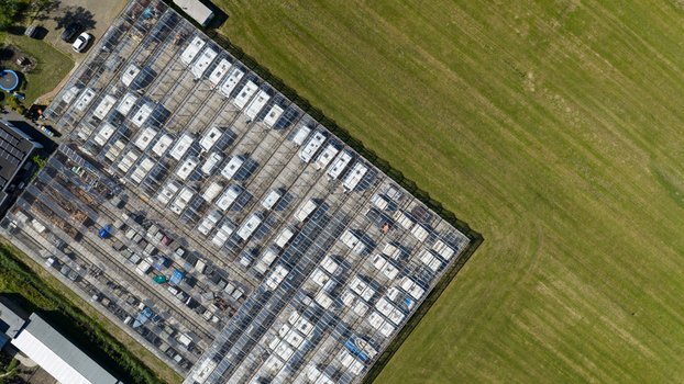 Aerial view of Caravanstalling Klijn a large storage facility for caravans and campers under a glass roof situated next to green fields in Alkmaar Noord Holland Netherlands. Aerial view of Caravanstalling Klijn a large storage facility for caravans and campers under a glass roof situated next to green fields in Alkmaar Noord Holland Netherlands.