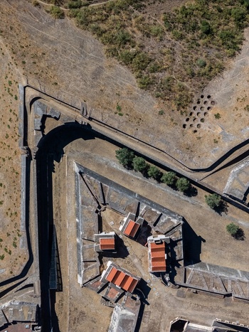 Elvas Portugal 10 September 2026 Aerial view of Forte de Nossa Senhora da Graca showing its star shaped walls terracotta roofed buildings and dry landscape. Elvas Portugal 10 September 2026 Aerial view of Forte de Nossa Senhora da Graca showing its star shaped walls terracotta roofed buildings and dry landscape.