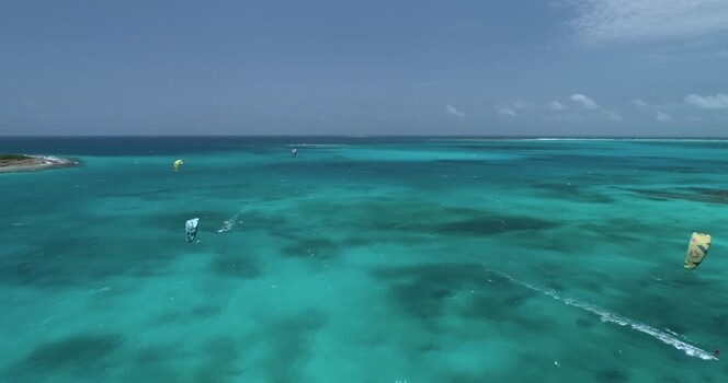 Aerial view of kite surfers in Los Roques archipelago Venezuela.
