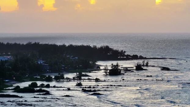 Aerial view of Cap Malheureux coastline at sunset Mauritius.