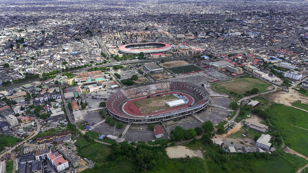 Aerial view of the National Stadium Surulere and the surrounding dense urban landscape with the Teslim Balogun Stadium in Surulere Lagos Lagos Nigeria. Aerial view of the National Stadium Surulere and the surrounding dense urban landscape with the Teslim Balogun Stadium in Surulere Lagos Lagos Nigeria.
