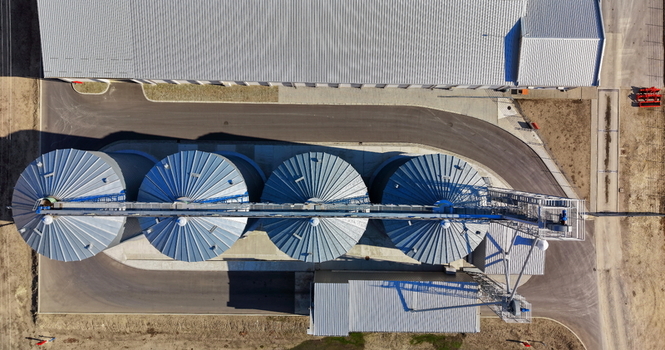 Aerial view of the storage silo Bavaniste with its metallic circular structures and surrounding industrial facility in Bavaniste Vojvodina Serbia.