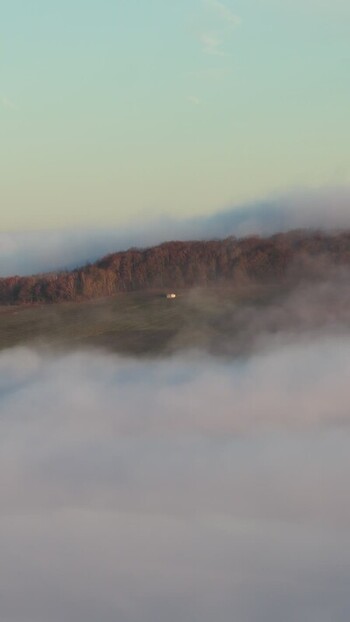 Aerial view of a house above the clouds France.