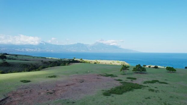 Aerial view of Mausui Savanna and coastal hills Indonesia.