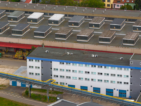 Aerial view of an industrial facility featuring rooftop ventilation units and administrative offices in Breclav South Moravian Region Czechia.