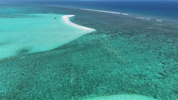 Aerial view of a long white sandbank and coral reefs Maldives. Aerial view of a long white sandbank and coral reefs Maldives.