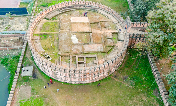 Aerial view of the historic Idrakpur Fort its brick walls standing in stark contrast to the surrounding green fields Munshiganj Dhaka Division Bangladesh. Aerial view of the historic Idrakpur Fort its brick walls standing in stark contrast to the surrounding green fields Munshiganj Dhaka Division Bangladesh.