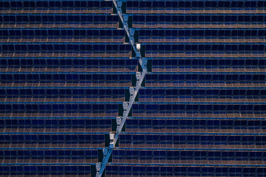 Aerial view of floating solar farm with rows of panels on the water in Bensheim Hessen Germany. Aerial view of floating solar farm with rows of panels on the water in Bensheim Hessen Germany.