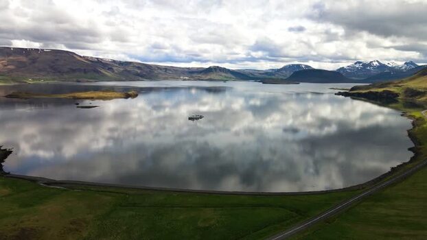 Aerial view of Hvalfjordur fjord with mountain reflections Iceland. Aerial view of Hvalfjordur fjord with mountain reflections Iceland.
