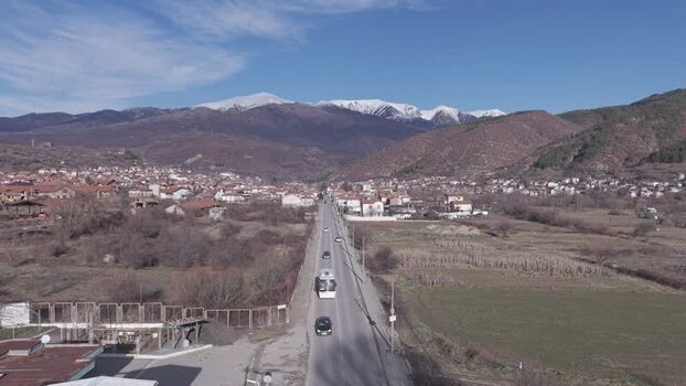 Aerial view of a road leading towards a town in Bulgaria.