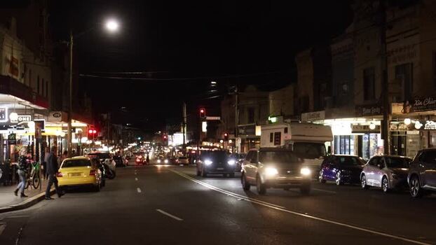 View of a busy street at night in Sydney Australia.