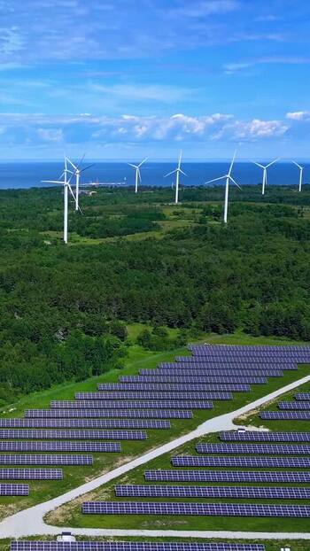 Aerial view of wind and solar farm in Estonia. Aerial view of wind and solar farm in Estonia.