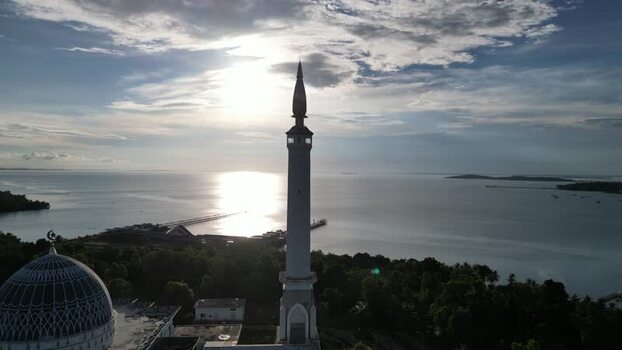 Aerial view of Masjid Raya Nur Ilahi at sunset Indonesia. Aerial view of Masjid Raya Nur Ilahi at sunset Indonesia.