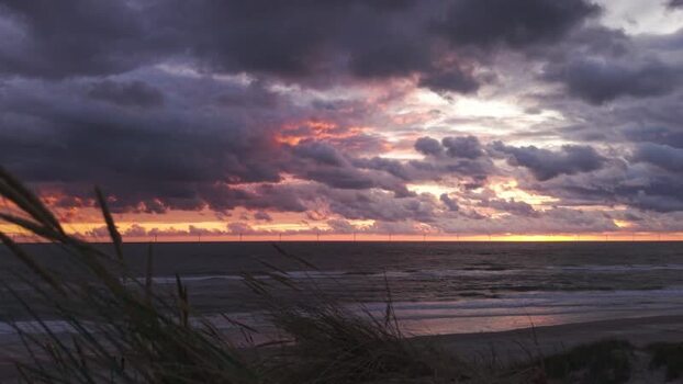 Aerial view of sunset over Lyngvig Fyr Strand Denmark.