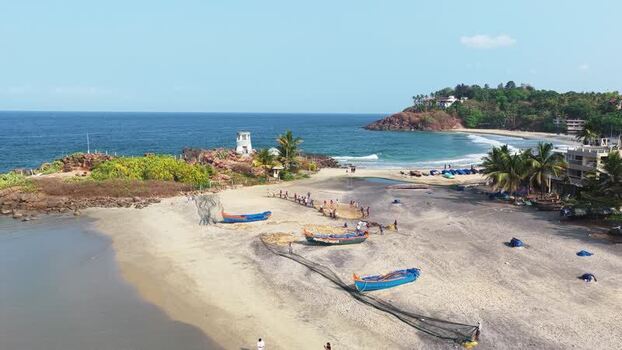 Aerial view of fishermen with boats on Kovalam Beach India. Aerial view of fishermen with boats on Kovalam Beach India.