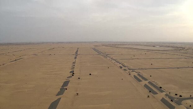 Aerial view of desert roads covered by sand United Arab Emirates.