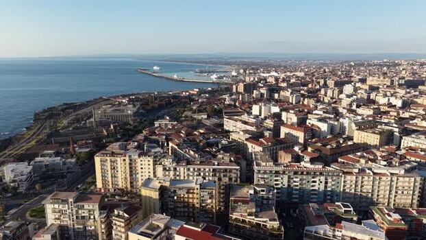 Aerial view of the coastal city and harbor of Catania Italy. Aerial view of the coastal city and harbor of Catania Italy.