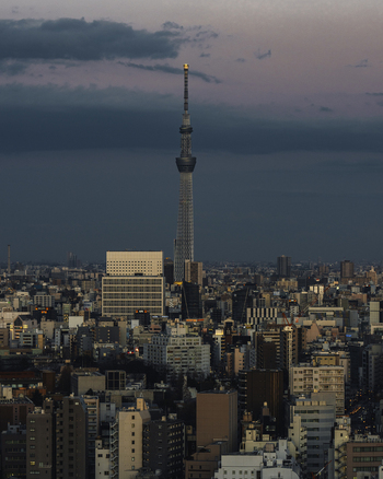Aerial view of Tokyo Skytree piercing the dusky sky a modern beacon amidst the sprawling cityscape Bunkyo City Tokyo Japan. Aerial view of Tokyo Skytree piercing the dusky sky a modern beacon amidst the sprawling cityscape Bunkyo City Tokyo Japan.