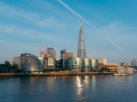 London United Kingdom 20 June 2025 View of The Shard piercing the sky reflections shimmering on the Thames and modern buildings lining the waterfront. London United Kingdom 20 June 2025 View of The Shard piercing the sky reflections shimmering on the Thames and modern buildings lining the waterfront.