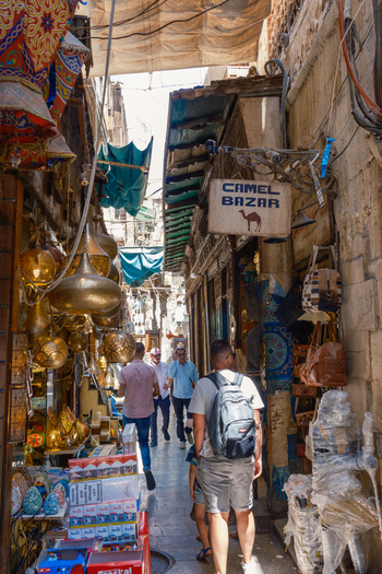 Cairo Egypt 20 April 2026 View of Khan el Khalili bazaar with people walking through a narrow alley lined with traditional brass lamps and souvenir shops. Cairo Egypt 20 April 2026 View of Khan el Khalili bazaar with people walking through a narrow alley lined with traditional brass lamps and souvenir shops.