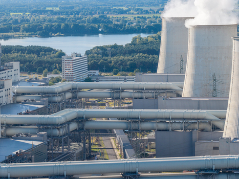 Aerial view of Janschwalde Power Station with cooling towers and industrial pipelines in Peitz Brandenburg Germany. Aerial view of Janschwalde Power Station with cooling towers and industrial pipelines in Peitz Brandenburg Germany.
