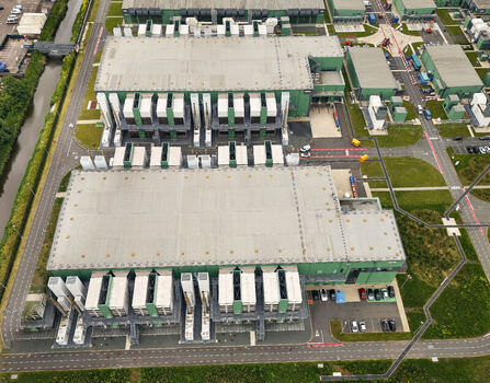 Middenmeer Netherlands 15 June 2026 Aerial view of the Microsoft Datacenter at AMS campus Agriport showing industrial buildings with cooling systems and backup power plants.