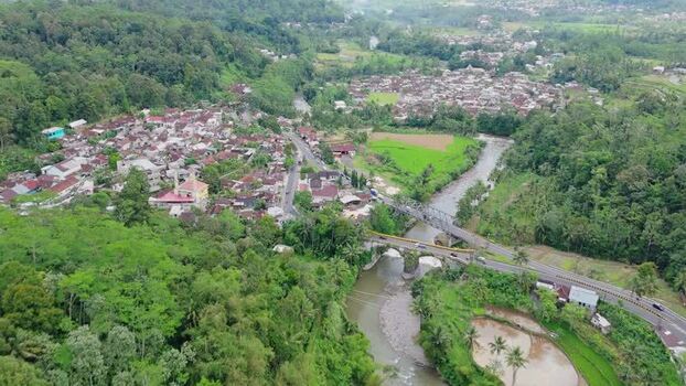Aerial view of a village and river in Dieng Indonesia. Aerial view of a village and river in Dieng Indonesia.
