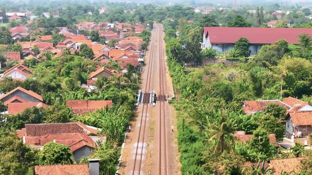 Aerial view of railway tracks through Pekalongan Indonesia. Aerial view of railway tracks through Pekalongan Indonesia.