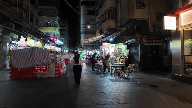 View of a bustling night street in Hong Kong Hong Kong.