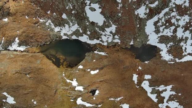 Aerial view of glacial lake near Transfagarasan Romania. Aerial view of glacial lake near Transfagarasan Romania.
