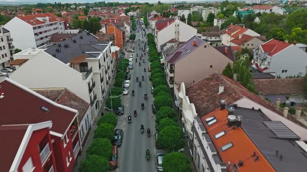 Aerial view of motorcycles on a street in Sremska Mitrovica Serbia. Aerial view of motorcycles on a street in Sremska Mitrovica Serbia.